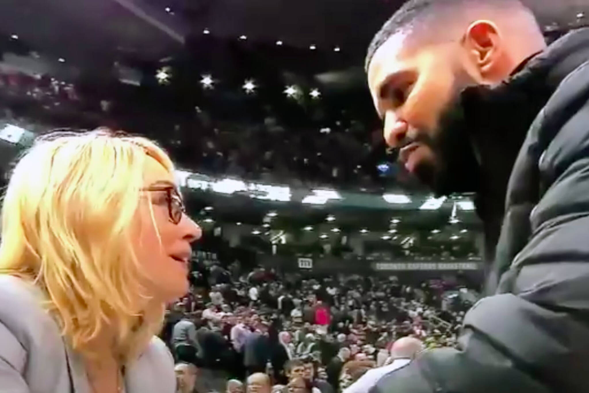 Drake kisses ESPN broadcaster Doris Burke at Raptors game