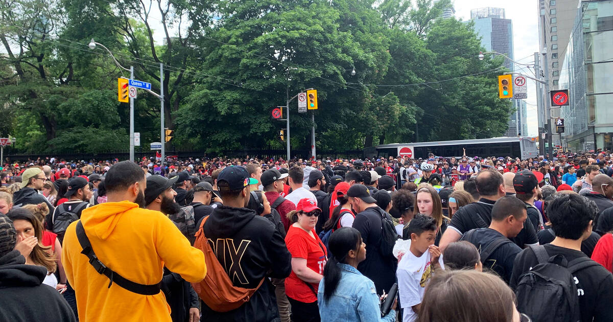 Toronto parade route is packed with fans to see the Raptors