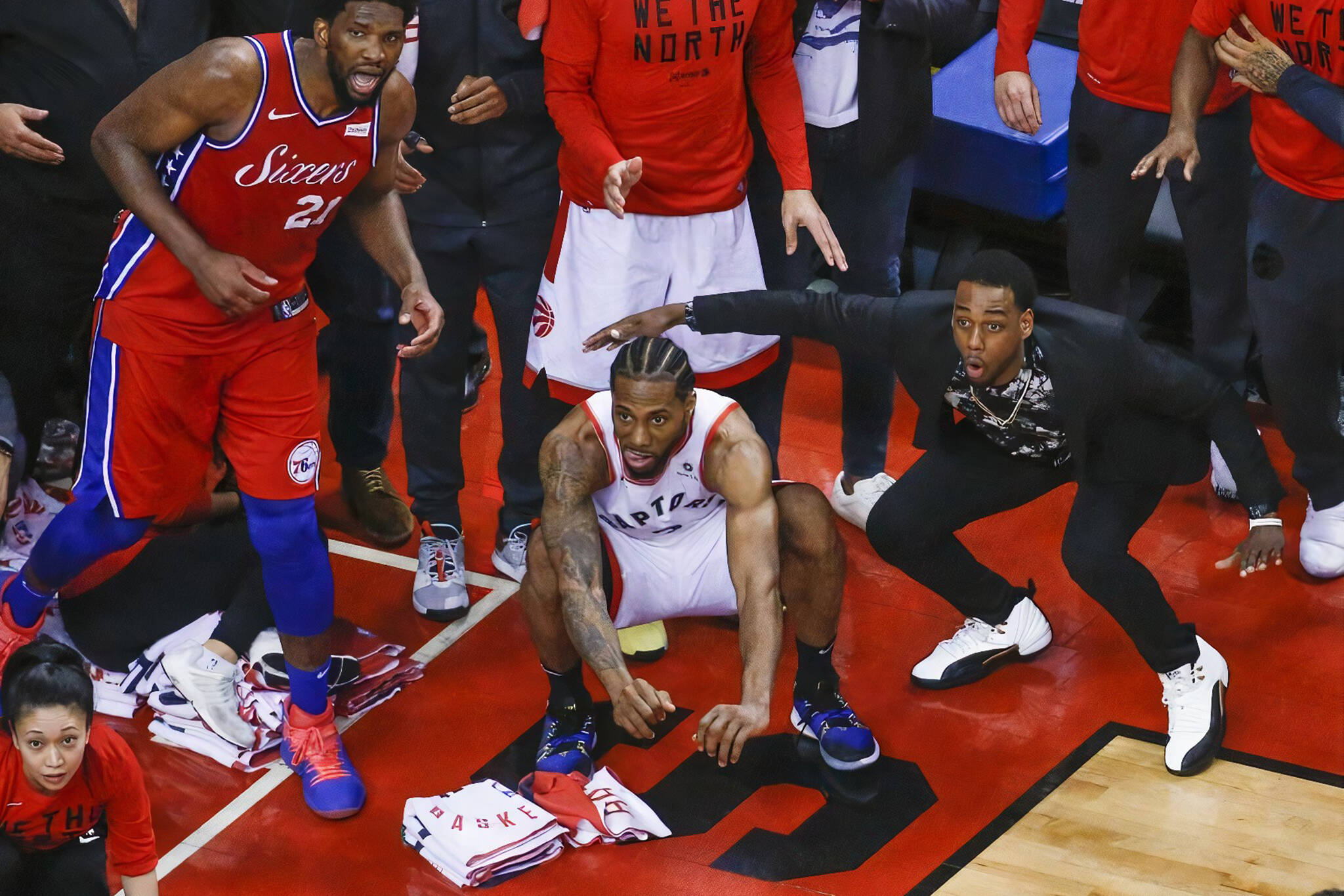 The random guy a suit the iconic Toronto Raptors photo finally his ring