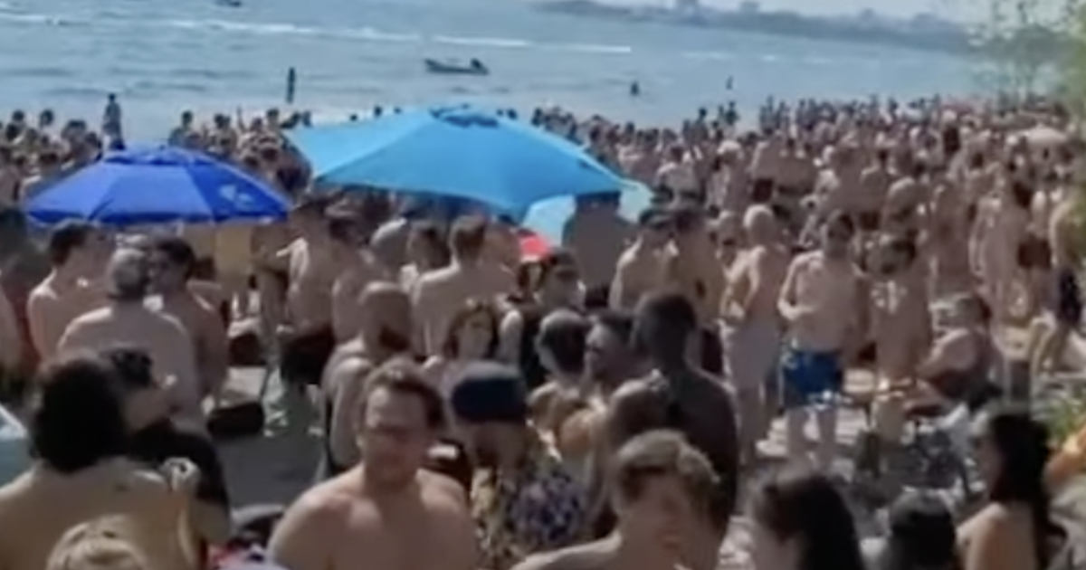 Massive Crowds Gather At Hanlans Point For Beach Party In Toronto