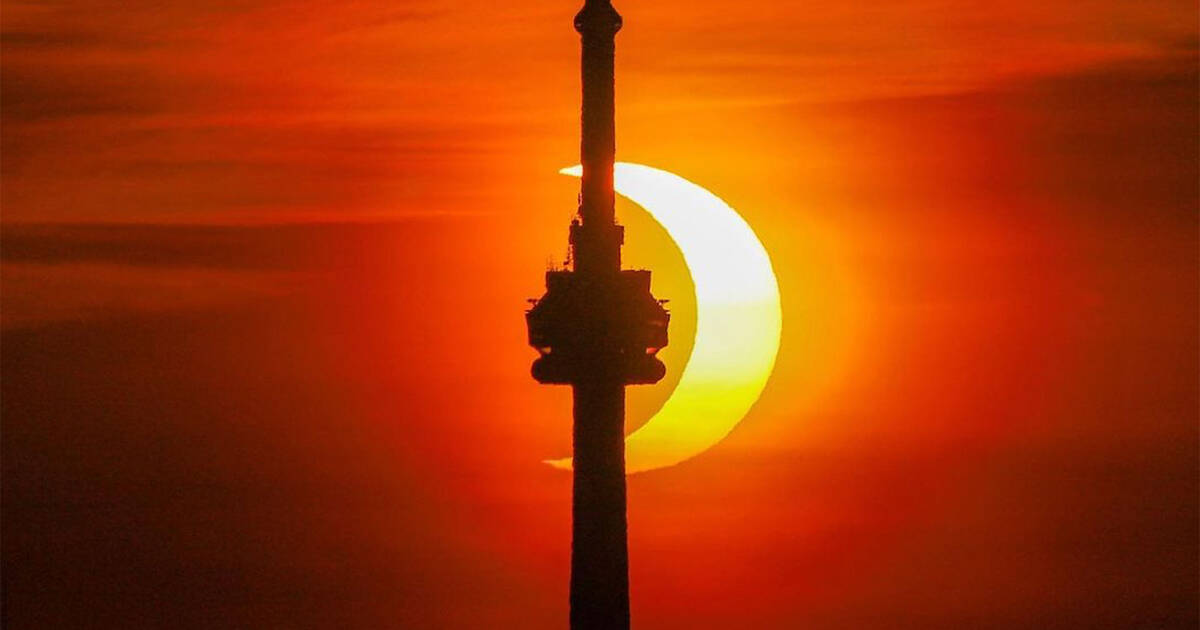 Toronto woke up early for the solar eclipse and the photos are breathtaking