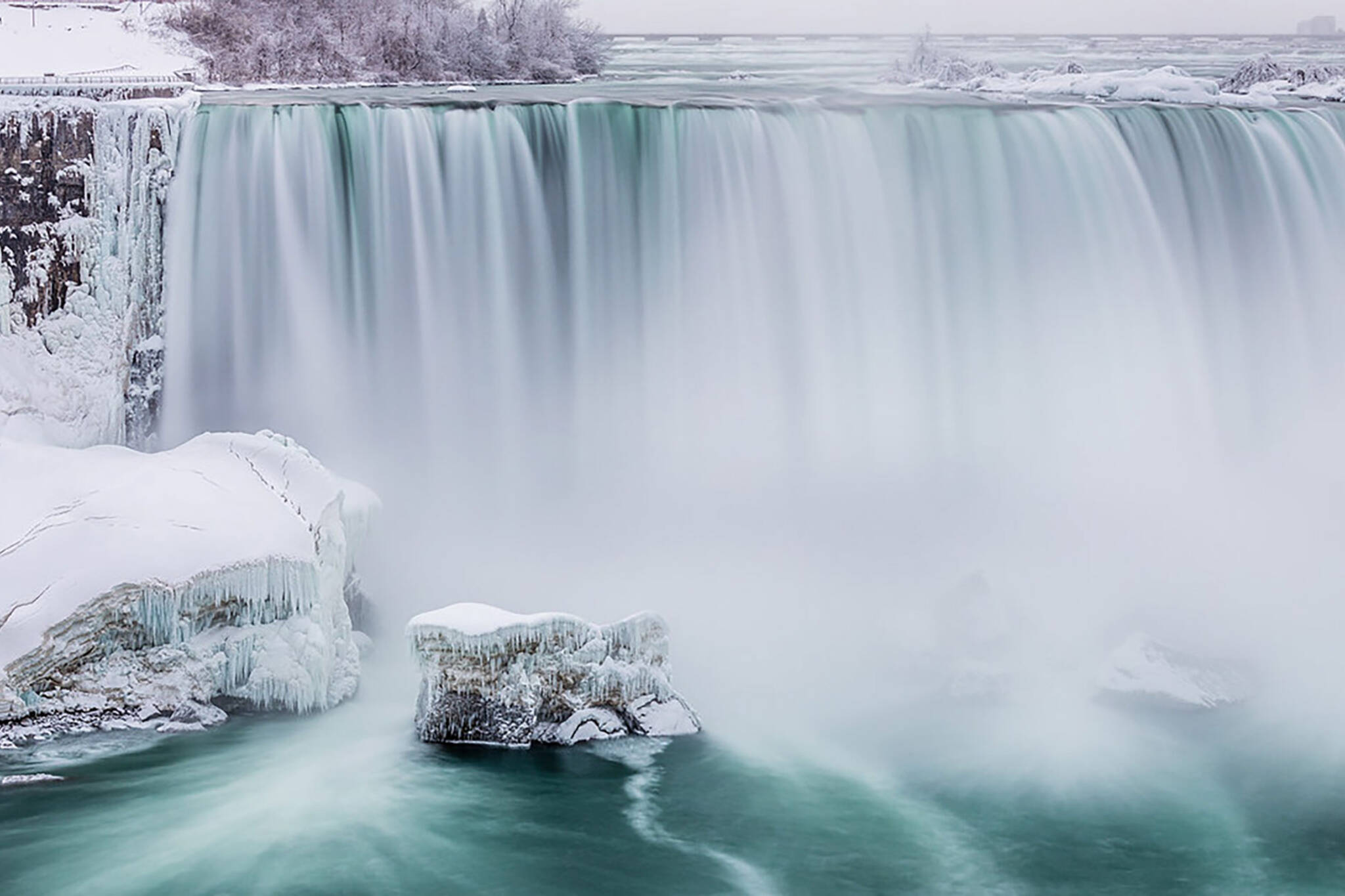 Niagara Falls is completely frozen over and it's so incredibly