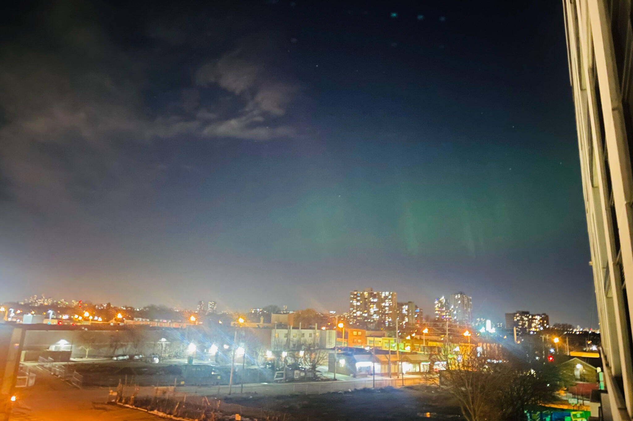 Dazzling photos show Northern Lights appear over downtown Toronto in