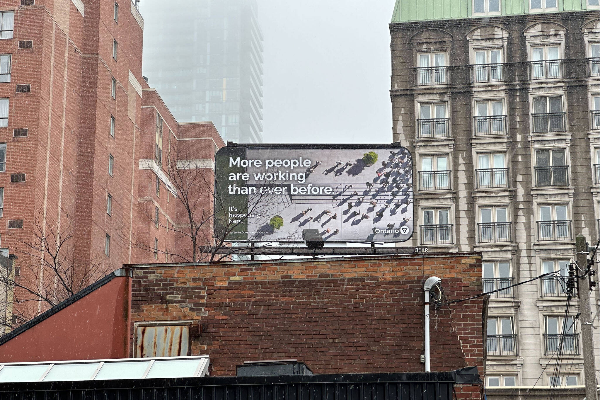 dystopian billboard toronto