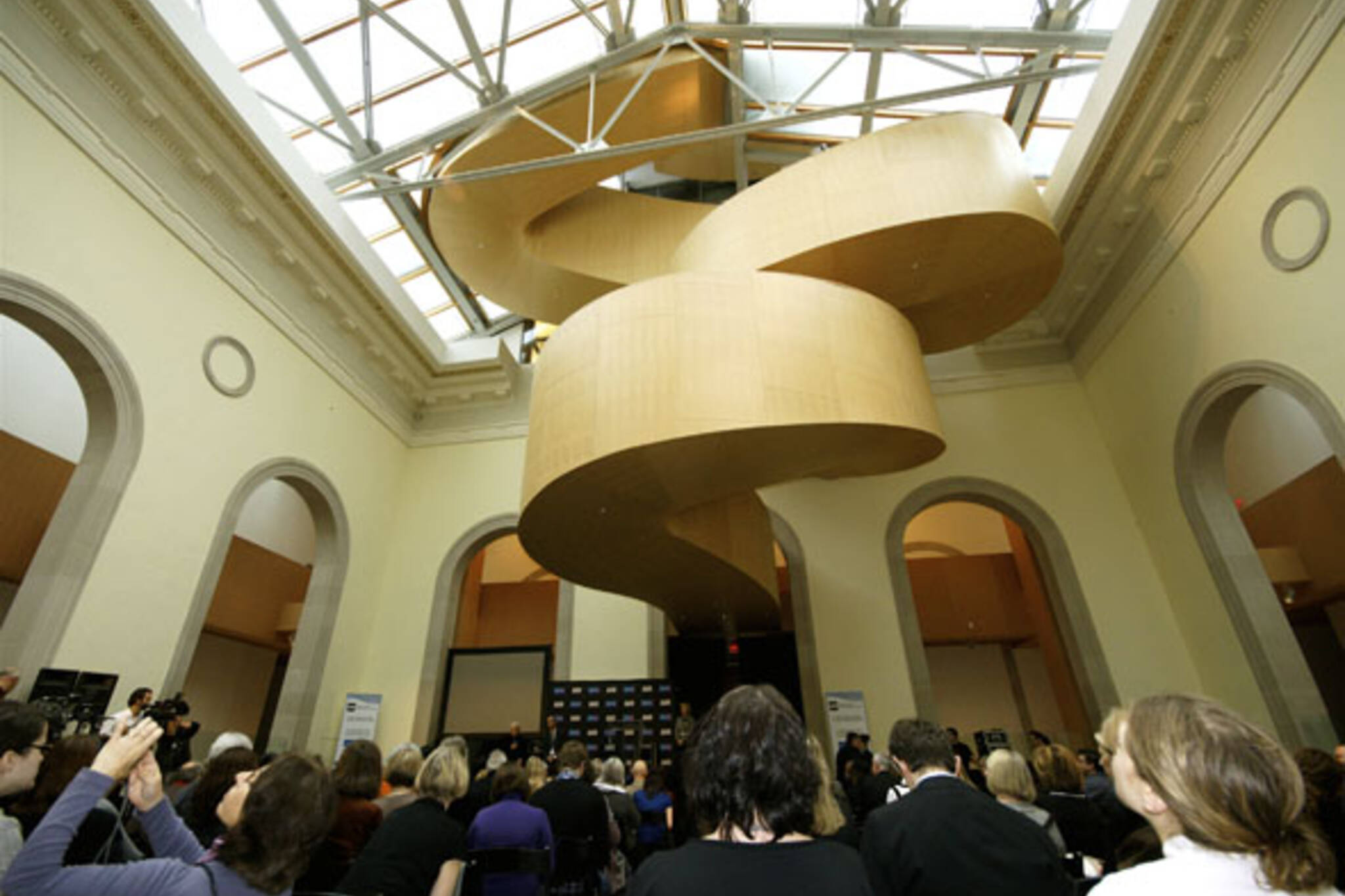 The New Art Gallery of Ontario (AGO) opens to a crowd with architect Frank Gehry