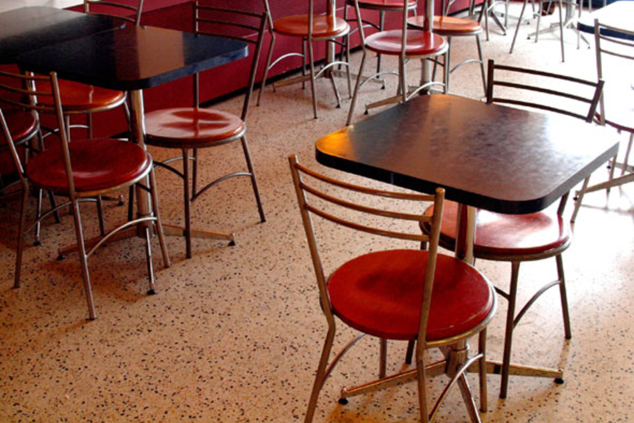 Empty chairs inside La Paloma