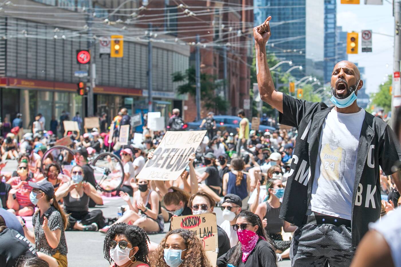 Protesters stage sitin outside Toronto Police headquarters in support