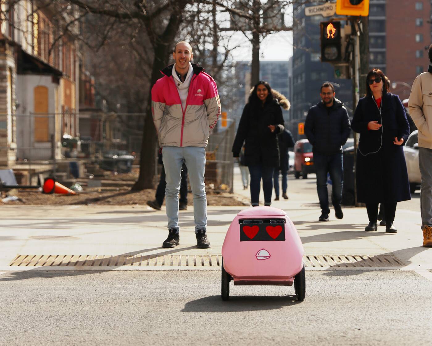Meet Geoffrey, the Pink Robot with Heart-Shaped Eyes that Delivers Coffee  in Charlotte, News