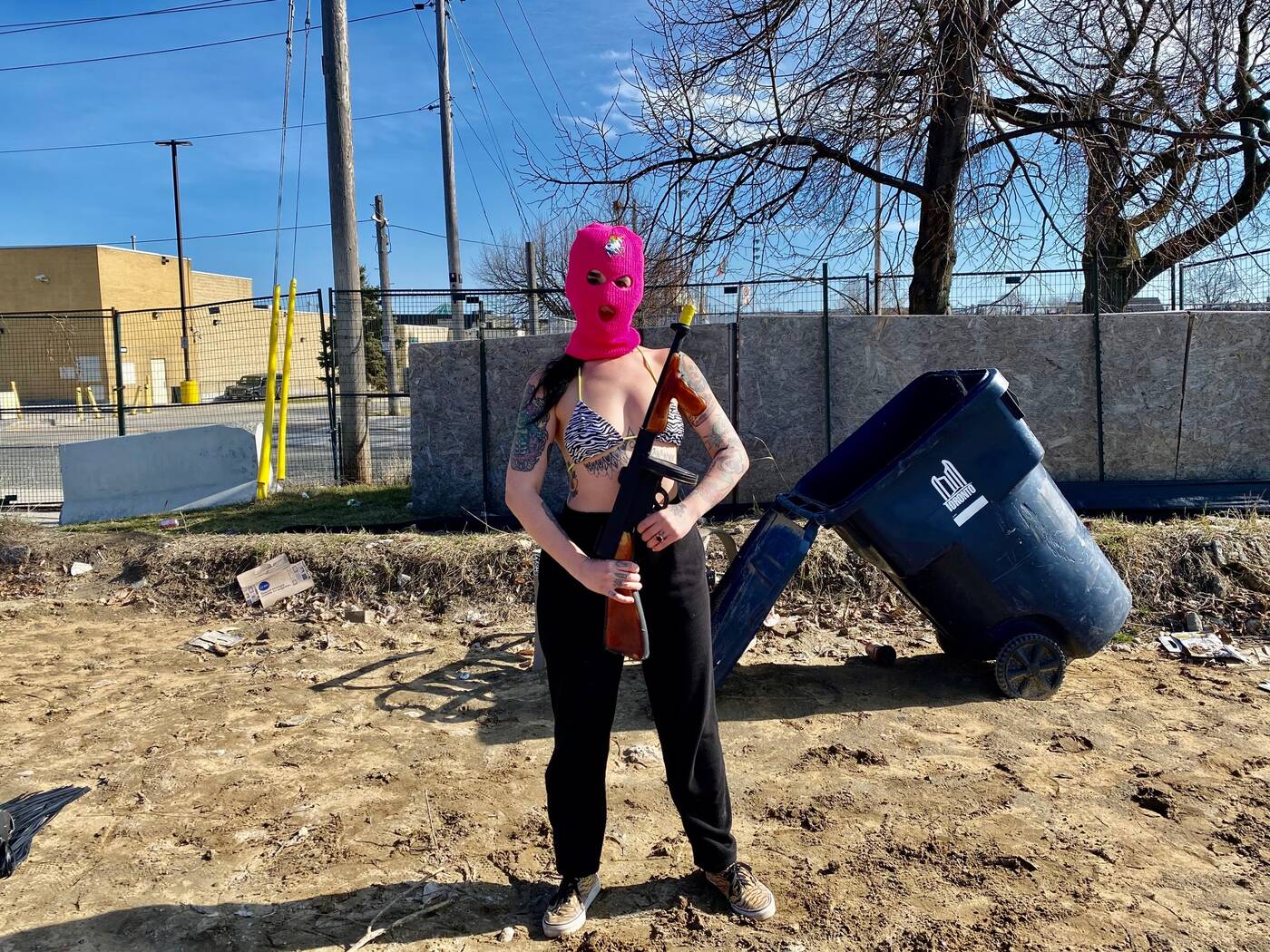 Here's why people were wearing hot pink balaclavas on Toronto's fake beach - blogTO