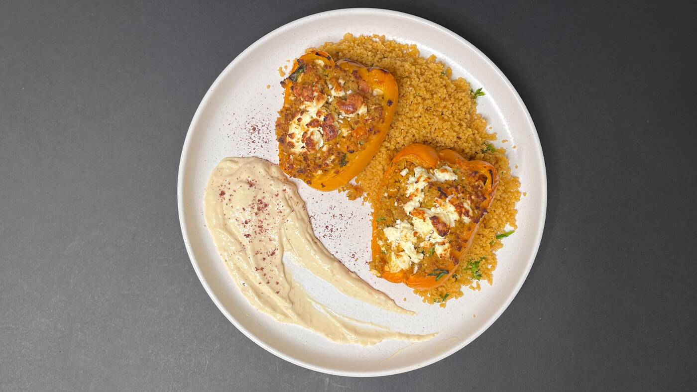 Falafel stuffed peppers topped with feta and a side of hummus